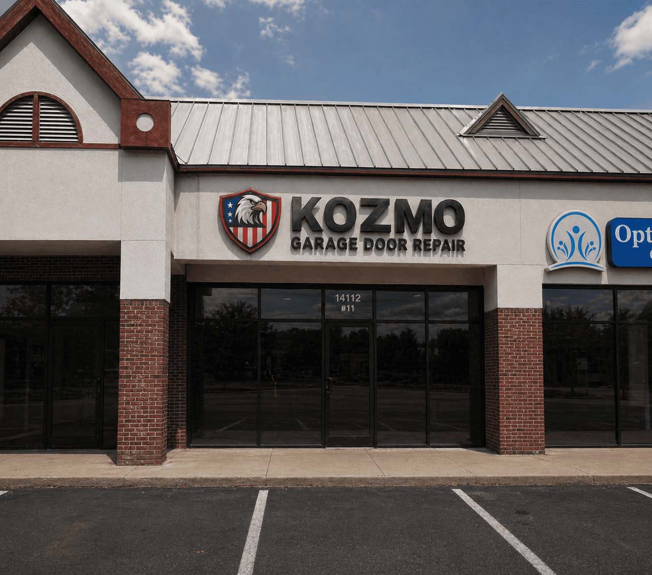Kozmo Garage Door Repair storefront with the shield logo signage